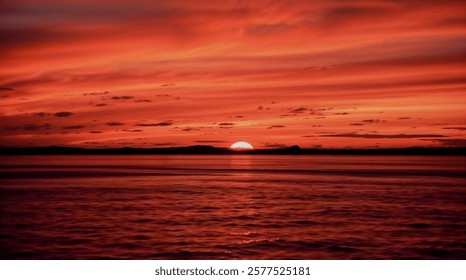 Mesmerizing Red Sunset Over Calm Ocean Waters - Powered by Shutterstock - Get 15% off with code: PIKWIZARD15