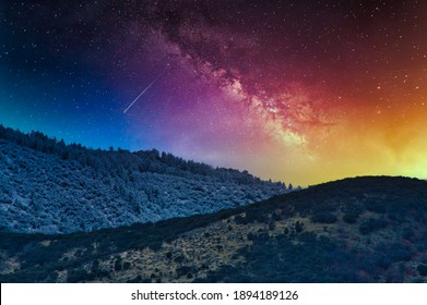 A Mesmerizing Starry Sky Over The Forested Mountains