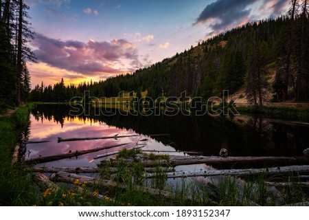 A mesmerizing sunset over Lake Irene in Colorado, USA