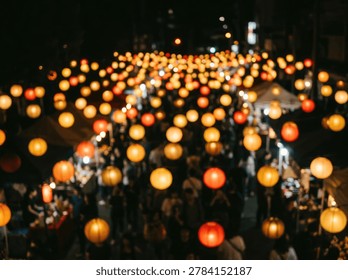 A mesmerizing view of countless glowing lanterns at a nighttime festival. The blurred crowd and warm light create a magical and festive atmosphere