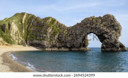 A mesmerizing view of Durdle Door, limestone arch, landmark attraction on Dorset's Jurassic Coast, UK
