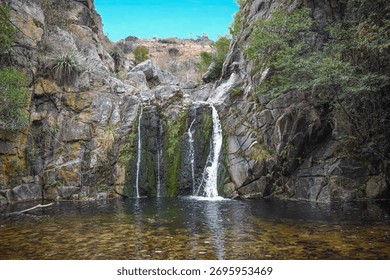 A mesmerizing waterfall hidden between rocks