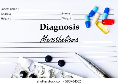 Mesothelioma -  Diagnosis Written On A Piece Of White Paper With Medication And Pills