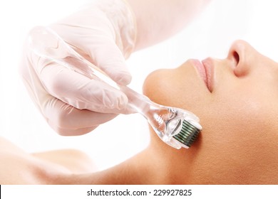 Mesotherapy microneedle, the woman at the beautician.Rejuvenation, beautification, the woman at the beautician, Mesotherapy microneedle
