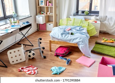mess, disorder and interior concept - view of messy home kid's room with scattered stuff - Shutterstock ID 1791390884
