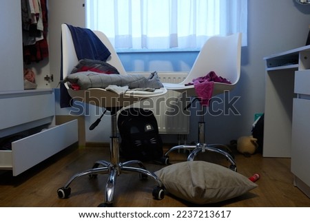 mess, disorder and interior concept - view of messy home kid's room with scattered stuff