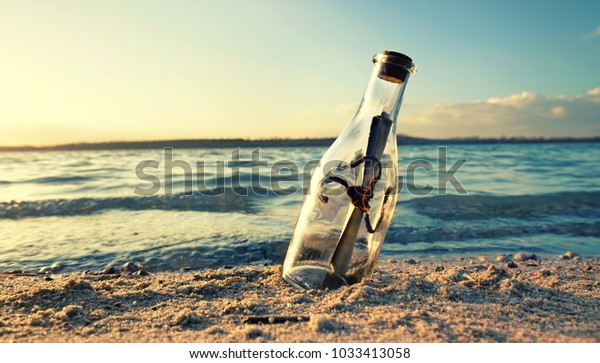 message in a bottle at the\
beach