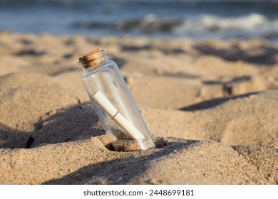 A message in a bottle is concealed in the sandy landscape of the beach, surrounded by soil, wood, and insects. A seabird with a beak carefully watches over the terrestrial animals nearby - Powered by Shutterstock