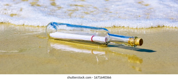 Message in a Bottle at the sandy beach.