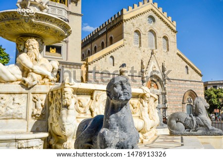 Messina Cathedral on the Mediterranean island of Sicily, Italy. Reclining marble figures and a sphinx highlight the Fountain of Orion in the Piazza Duomo