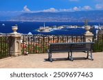 Messina city in Sicily, Italy. Bench with a view of Strait of Messina.