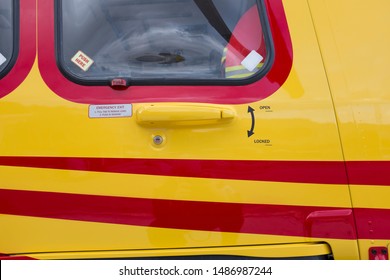 Messina, Italy - May 29 2019: Regional EMS Helicopter In  Service At Papardo Hospital. Detail Of Door Handle, Cabin Window And Emergency Exit Opening System.