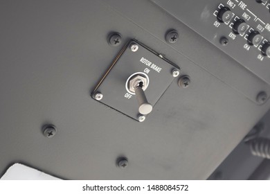 Messina, Italy - May 29 2019: Regional EMS Helicopter In  Service At Papardo Hospital. Detail Of The Switch Located On Rotor Brake Control Panel.