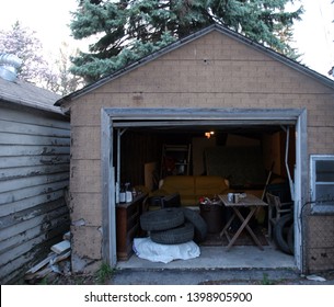 A Messy Abandoned Garage Full Of Stuff