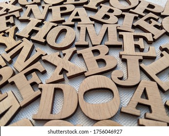 messy alphabet letters made of wood