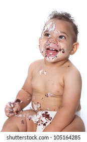 Messy Baby Boy Eating Cake On His 1st Birthday