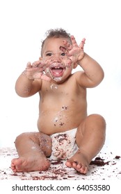 Messy Baby Boy Eating Cake On His 1st Birthday