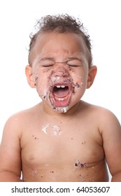 Messy Baby Boy Eating Cake On His 1st Birthday