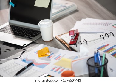 Messy And Cluttered Office Desk