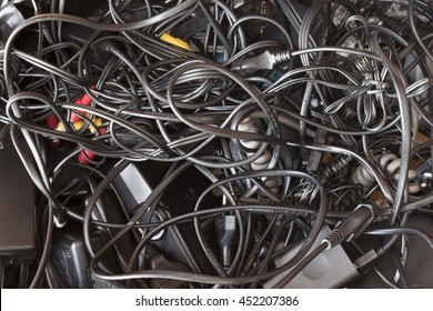 Messy Drawer Full Of Wires And Cables  In A Complete Disorder