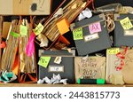 messy file folders and storage boxes in a cluttered office bookshelf,red tape,bureaucracy,overworked,business concept,free copy space.