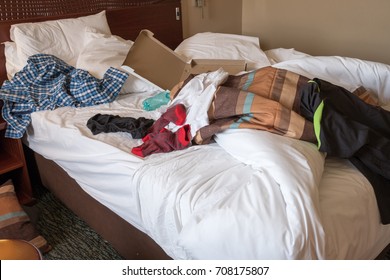 Messy Hotel Room Bed After A Night Of Partying