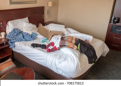 Messy Hotel Room Bed After A Night Of Partying