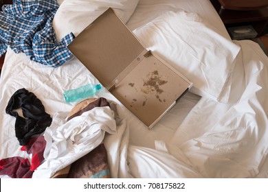 Messy Hotel Room Bed After A Night Of Partying