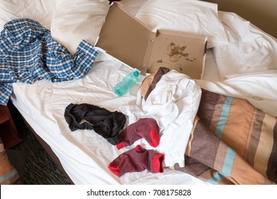 Messy Hotel Room Bed After A Night Of Partying