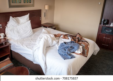 Messy Hotel Room Bed After A Night Of Partying