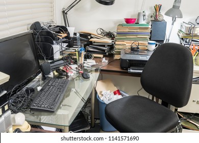 Messy Office With Clutter Filed Desk, Piles Of File Folders And Notebooks.