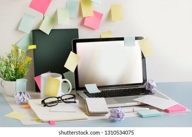 Messy Office Table Top With Text Space Laptop Screen.