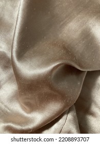 Messy Old Brown Satin Bedsheet