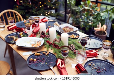 Messy Table With Leftover Vegetarian Meal After Christmas Lunch