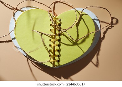 Messy Tangled Linen String On Blank Heart Shaped Note Pad. 