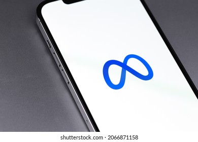 Meta logo on screen smartphone, iPhone closeup. Meta is the Facebook company's new name and logo. Moscow, Russia - October 28, 2021