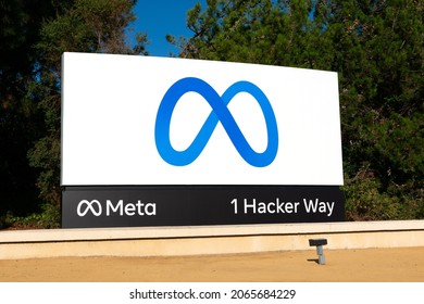 Meta sign, logo in front of Facebook headquarters on 1 Hacker Way. Facebook is changing name to Meta Platforms - Menlo Park, California, USA - October 28, 2021