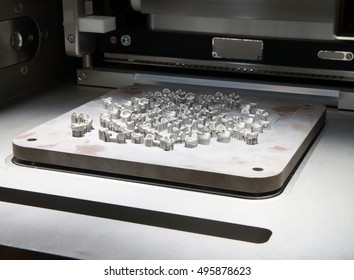 Metal 3D Printers (DMLS). Direct Metal Laser Sintering (DMLS) Is An Additive Manufacturing Technique That Uses A Ytterbium Fibre Laser Fired Into A Bed Of Powdered Metal.