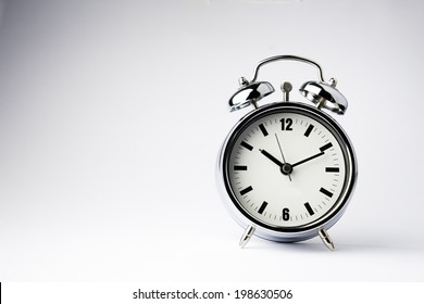 Metal Alarm Clock Work Time On White Background 10 Am. 