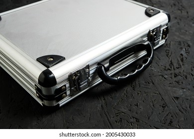 Metal Aluminum Briefcase On A Black Background