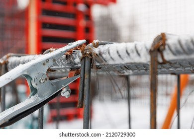 Metal Arc Welding Tongs Are Attached To The Steel Reinforcement To Weld The Framework Of Reinforced Concrete And Create Reinforced Concrete.