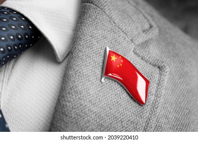 Metal Badge With The Flag Of China On A Suit Lapel