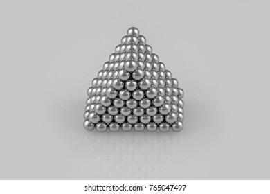 metal balls in triangular prism shape on white background