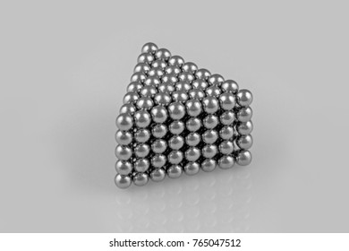 metal balls in triangular prism shape on white background