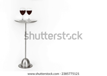 Similar – Image, Stock Photo Red tables, red stools, on them colorful plastic bowls, form a group of round shapes