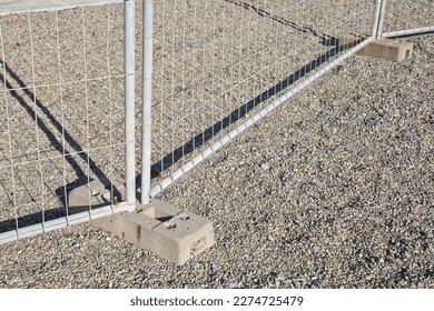 Metal barrier to delimit a construction site or a space to be protected - Shutterstock ID 2274725479