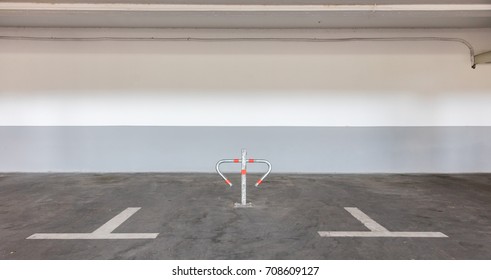 Metal Barrier For Private Parking In A Garage