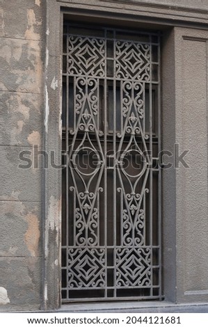 Metal bars on the window - details at the old art nouveau buildings in Timisoara.