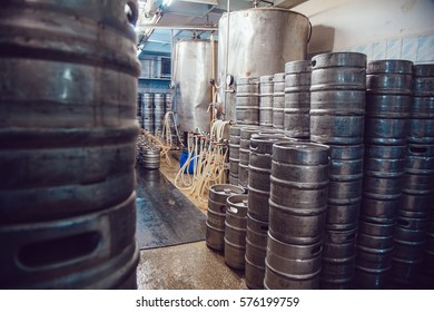 Metal Beer Kegs Stand In Beer Plant. Brewery.