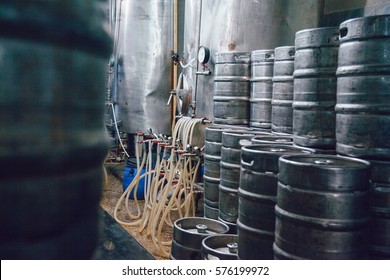 Metal Beer Kegs Stand In Beer Plant. Brewery.